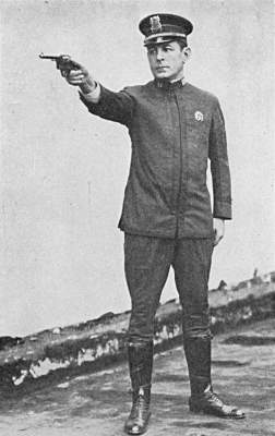 Captain Joseph Sonnenberg firing revolver