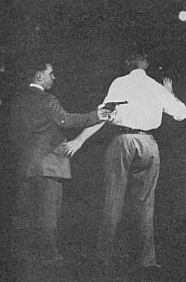 P2B Disarming revolver against back